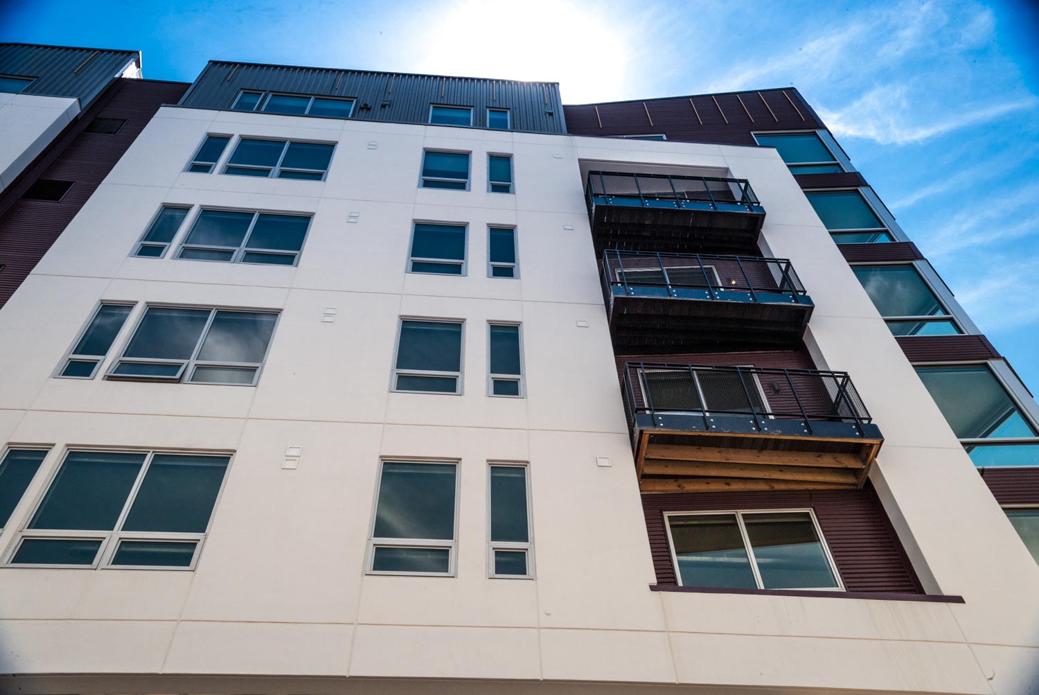 Wide angle side street view Walnut Capital apartments photo