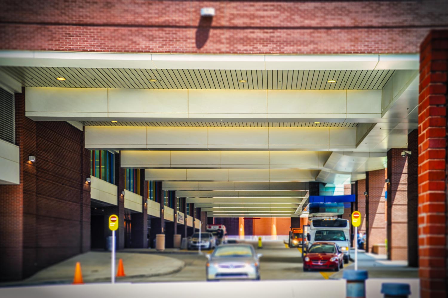Front of garage Children's Hospital metal  panels installed plus accent gray louvers photograph